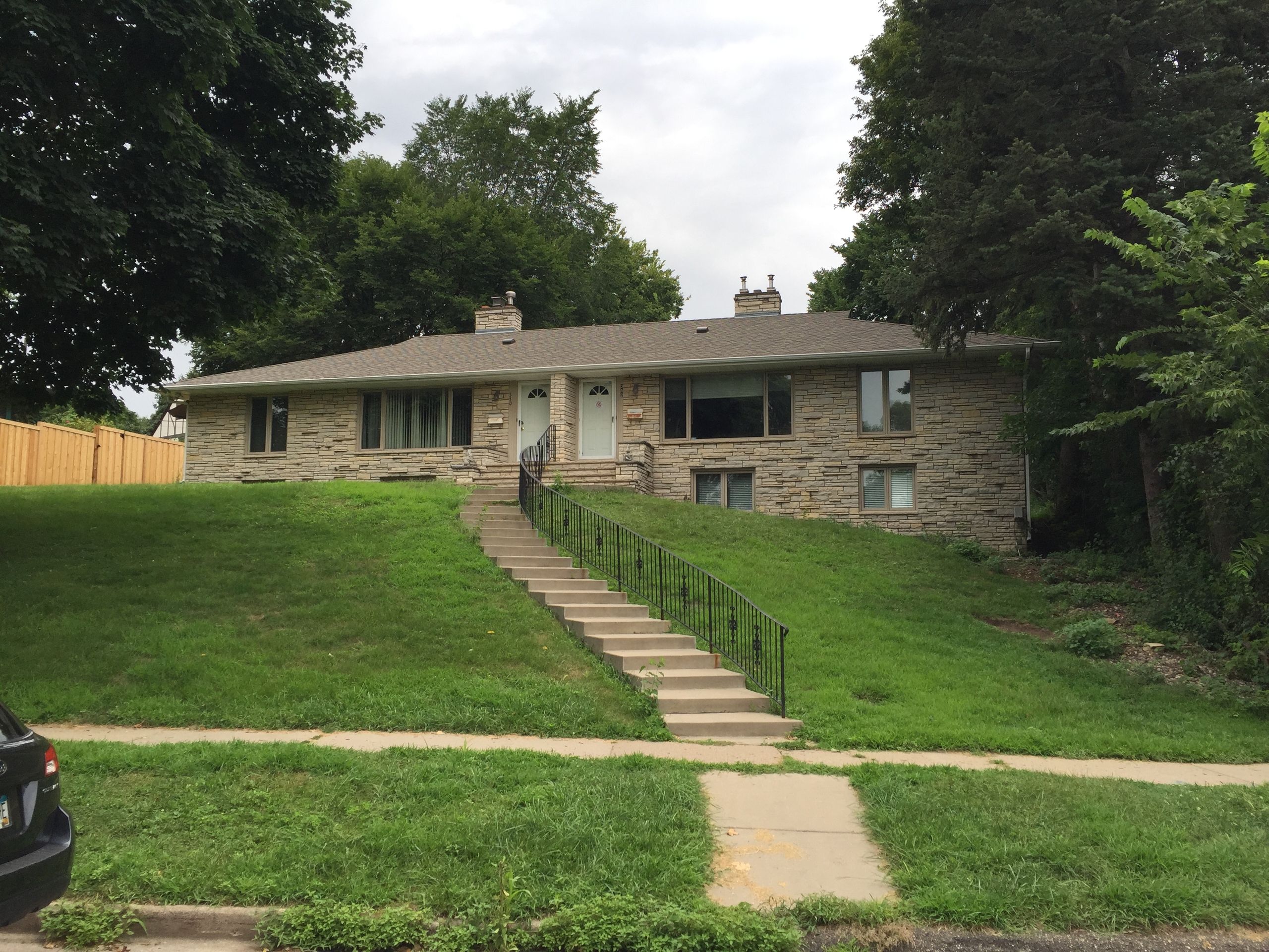 Stone rambler with new Gutters and downspouts