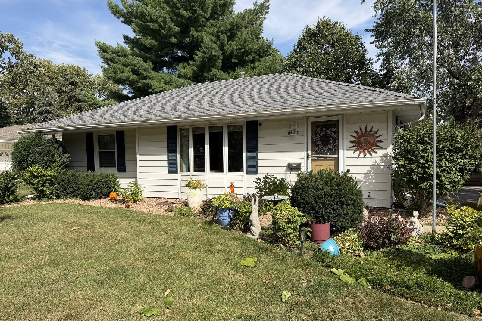 Replacement Gutter and downspout along the full eave of a rambler