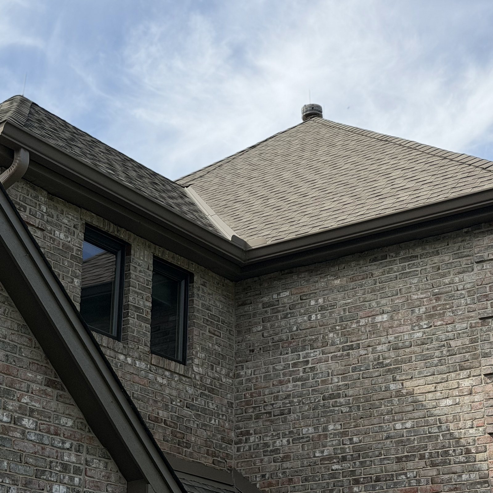 New Gutter running the eave directly below the roof it drains
